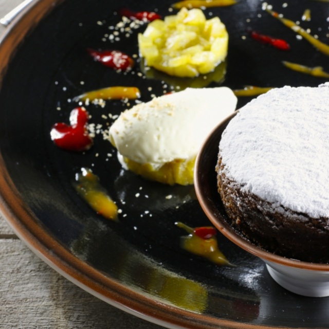 Chocolate soufflé with grilled pineapple