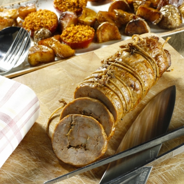 Varkensrollade met geroosterde tomaten