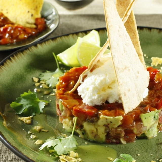 Avocado-tomato tartare with tortilla crisps