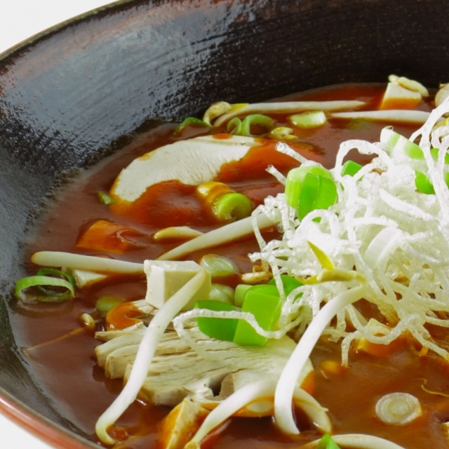 Chinese tomato soup with crispy noodles