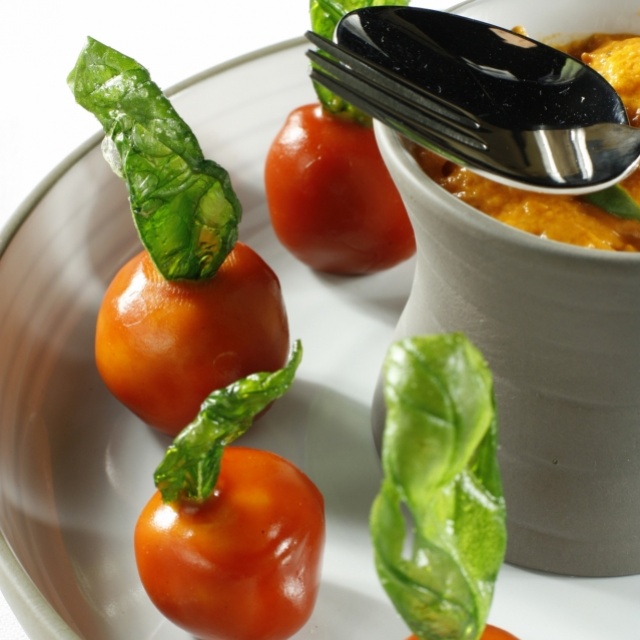 Goat’s cheese bonbon with tomato jelly and deep-fried basil